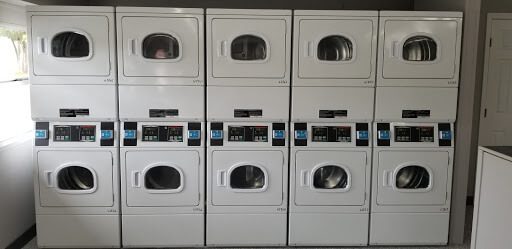 Speed Queen dryers in Sarasota Florida stacked on one another. 2 lines of 5 machines