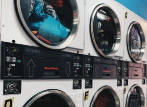 Speed Queen stacked laundry machines. Shows 6 machines in total