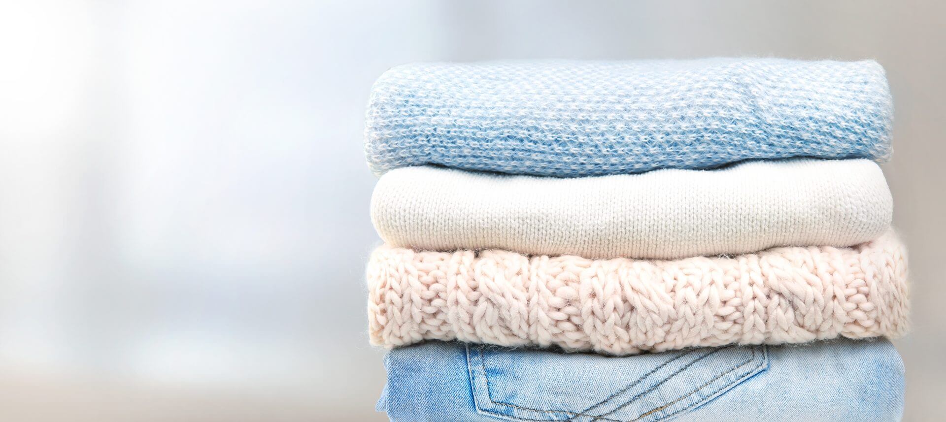 4 towels stacked up on one another, neatly folded