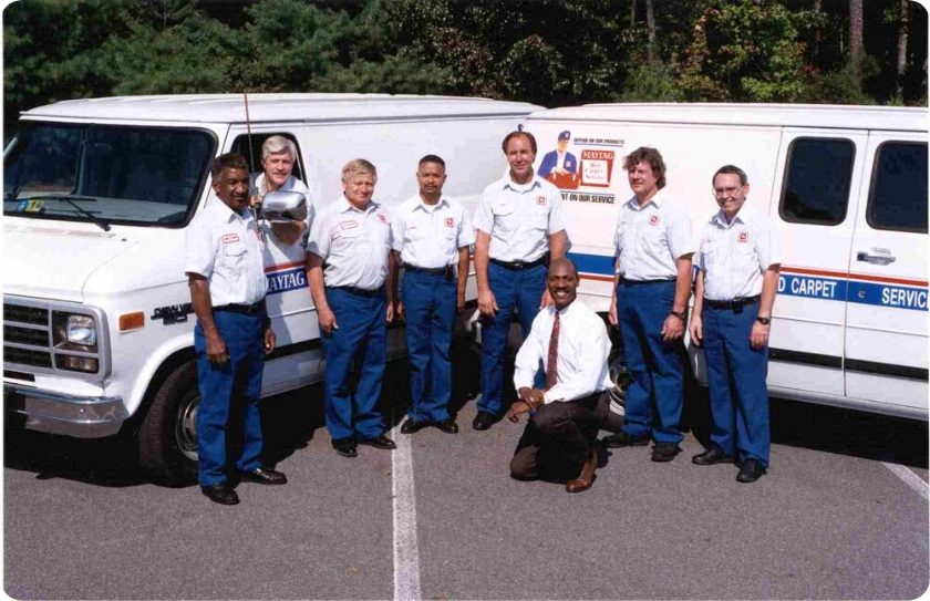 Maytag service technicians. Old photo showing employees from decades ago