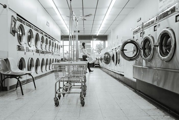Black and white laundry room photo taken from the floor