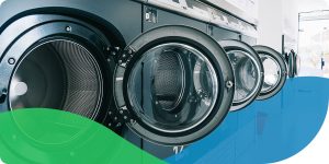 Starting a community laundry room - picture shows washing machines with their doors open